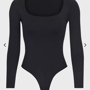 Skims - Essential Smoothing Scoop-Neck Thong Bodysuit